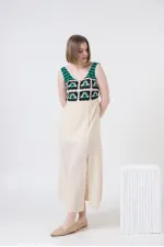 Robe en lin à bretelles avec appliques en pierre émeraude Topshow