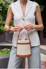 Canvas-Tan Bucket Hand and Shoulder Bag with Contrast Stitching Canvas-Tan Bucket Hand and Shoulder Bag with Contrast Stitching