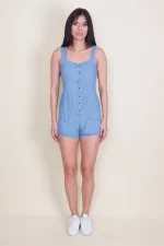 Combinaison à bretelles en denim bleu pour femme, avec boutons et poches